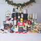 The Celebration Irish Hamper featuring a curated selection of traditional Irish gourmet foods and festive treats from GiftsDirect The Celebration Irish Hamper featuring a curated selection of traditional Irish gourmet foods and festive treats from GiftsDirect